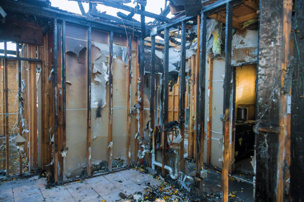 Professional Fire Damage Restoration technician working in Grayling, MI